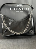 Coach Juliet in black leather.