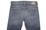 DIESEL BUSTER 084ZU JEANS SLIM TAPERED