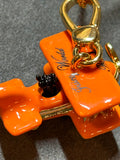 Juicy Couture Orange Aeroplane Necklace 60–66cm
