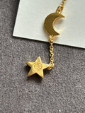 Pre-loved Tory Burch moon and star earrings