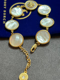 Pre-loved Tory Burch mother of pearl logo bracelet