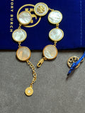 Pre-loved Tory Burch mother of pearl logo bracelet