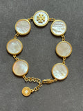 Pre-loved Tory Burch mother of pearl logo bracelet