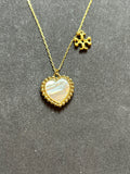 Pre-loved Tory Burch mother of pearl heart logo necklace