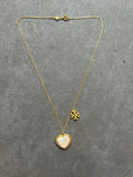 Pre-loved Tory Burch mother of pearl heart logo necklace