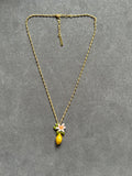 Pre-loved Les nereides lemon and flower necklace