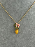 Pre-loved Les nereides lemon and flower necklace