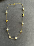 Tory Burch moon and star necklace