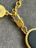 Pre-loved Tory Burch Black & Gold Logo Disc Bracelet
