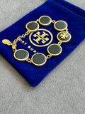Pre-loved Tory Burch Black & Gold Logo Disc Bracelet
