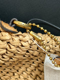 Coach Brooklyn Shoulder Bag in natural paper straw with leather trim.