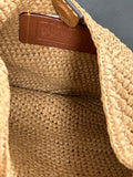 Coach Brooklyn Shoulder Bag in natural paper straw with leather trim.